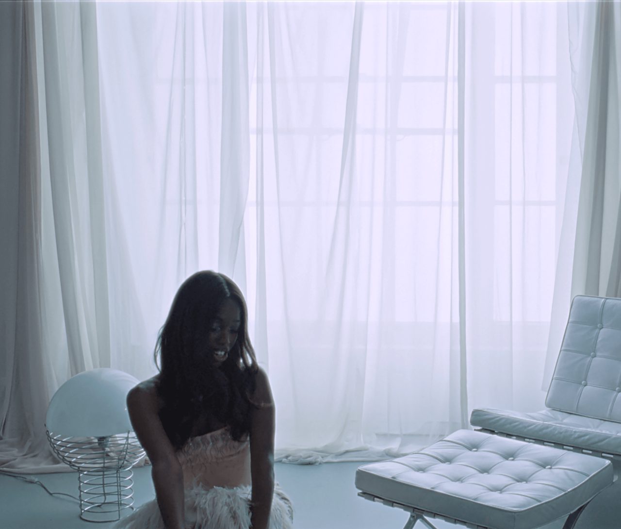 Watch John Glacier Live Out Her 007 Fantasies in New “Bond Girl” Video
