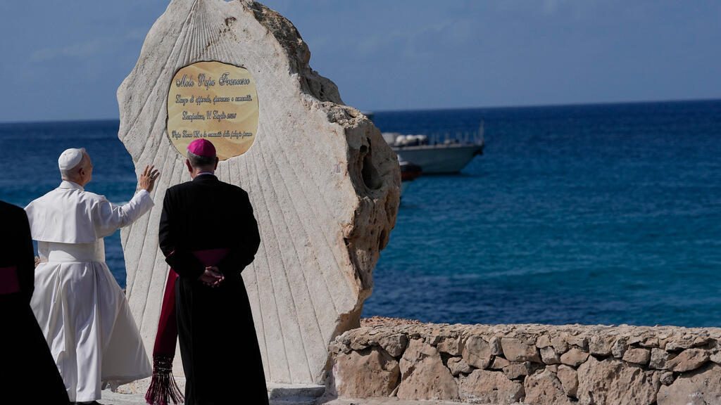 Pope defends migrants on symbolic visit to key immigration hub Lampedusa