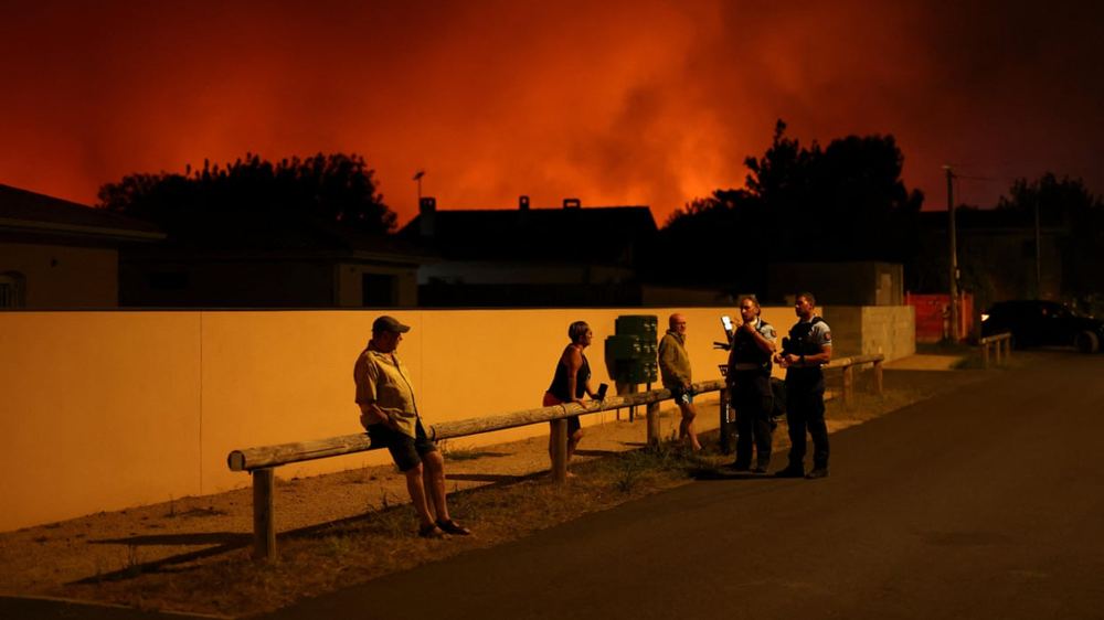 Wildfires ravage French tourist coasts as EU sends aid