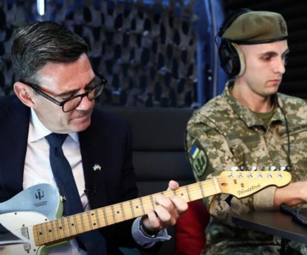 UK Prime Minister Andy Burnham Strums The Smiths For Ukrainian Soldier