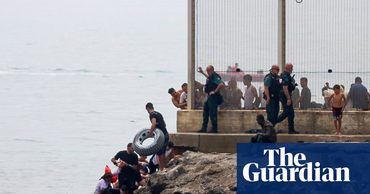 Spain sends extra troops and police to Ceuta after thousands of migrants arrive