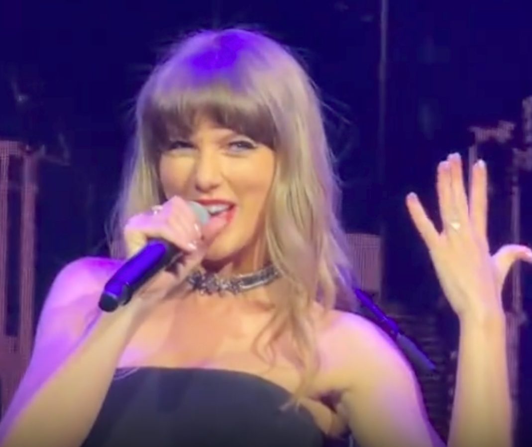 Country Star, Seemingly Engaged, Sings At Football Benefit