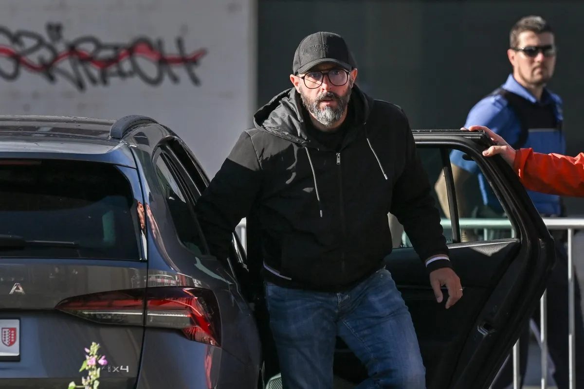 Owner of Swiss bar in deadly blaze held for domestic abuse