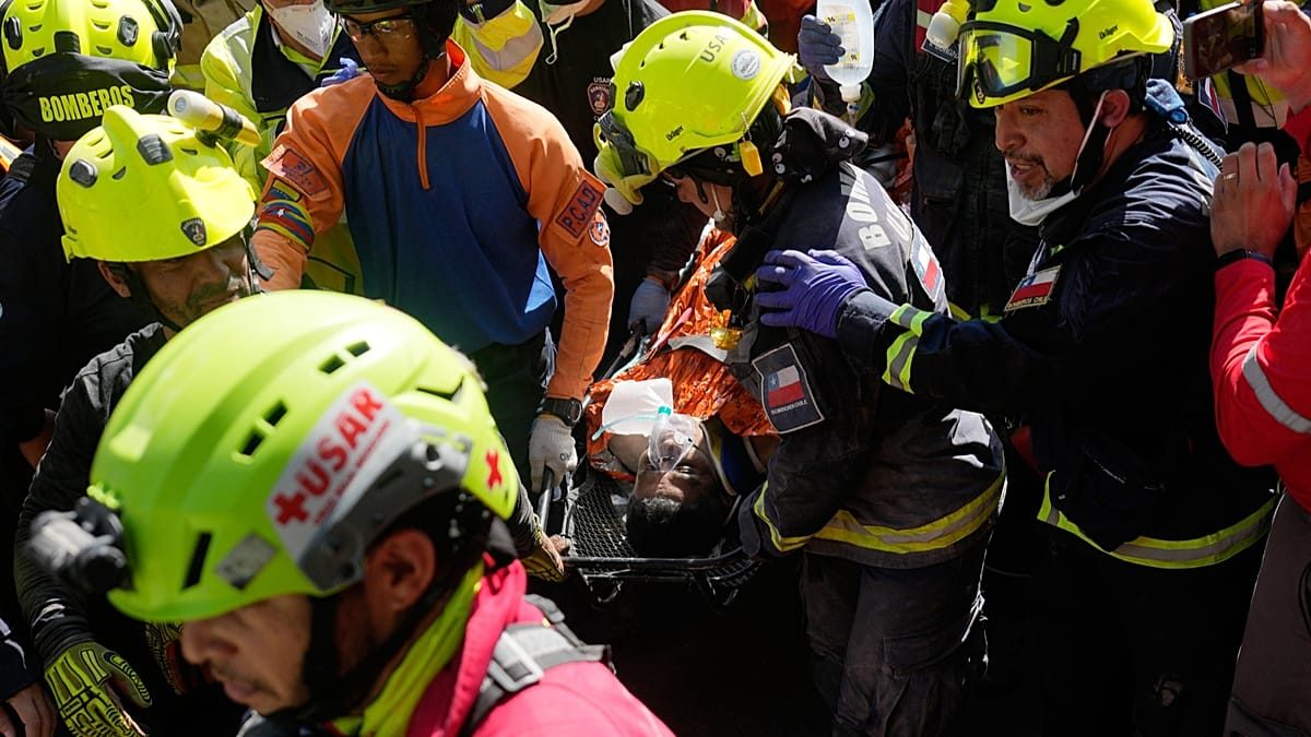 Venezuelan security guard pulled alive from basement eight days after twin quakes