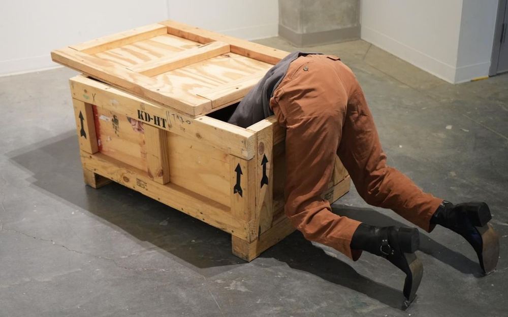 Police and firefighters break into gallery after sculpture is mistaken for a person in distress