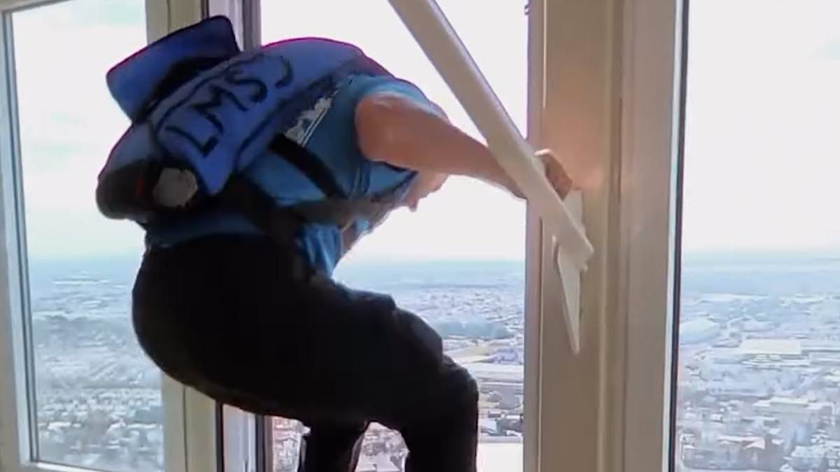 Moment 'selfish' thrill-seekers base jump from viewing deck of 518ft Blackpool Tower after opening window in front of families
