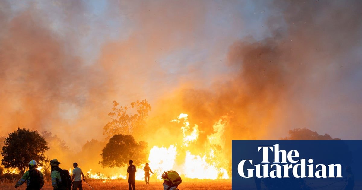 Race to extinguish blazes across Europe as fire weather breaks records