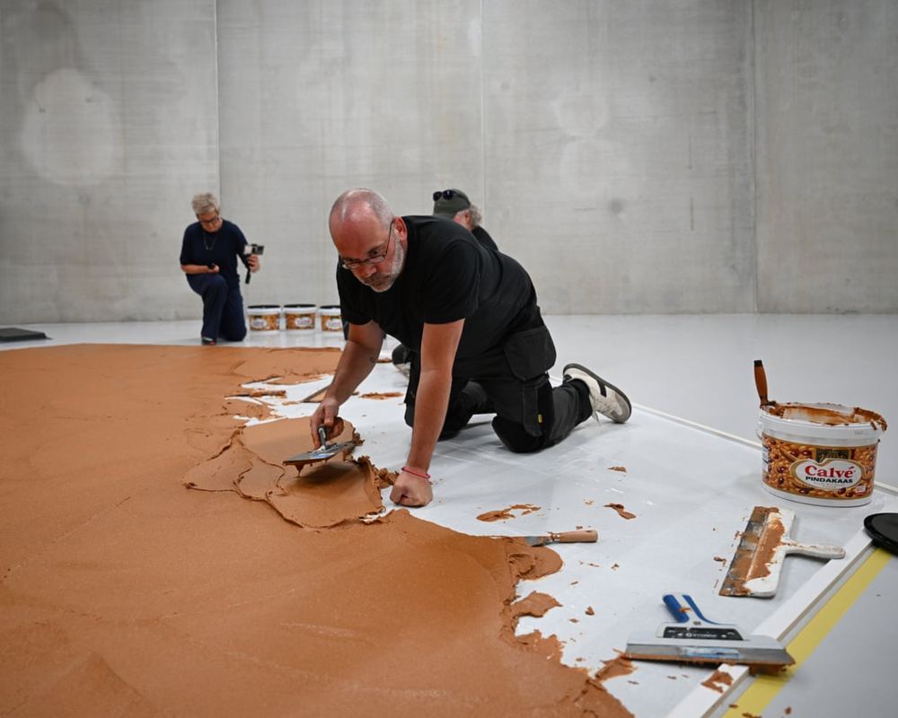 Completely nuts: Dutch gallery covers floor in peanut butter to honour late artist