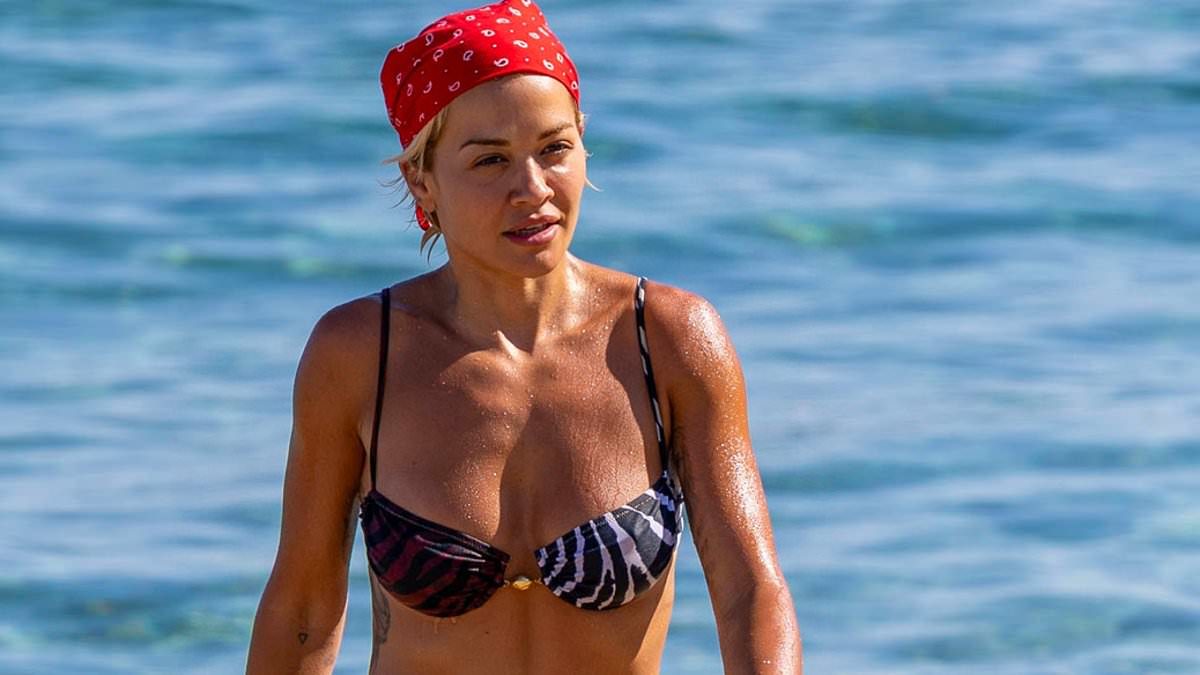 Rita Ora wears two-tone animal-print bikini as she enjoys a well-earned tour break on Spain's Mediterranean coast