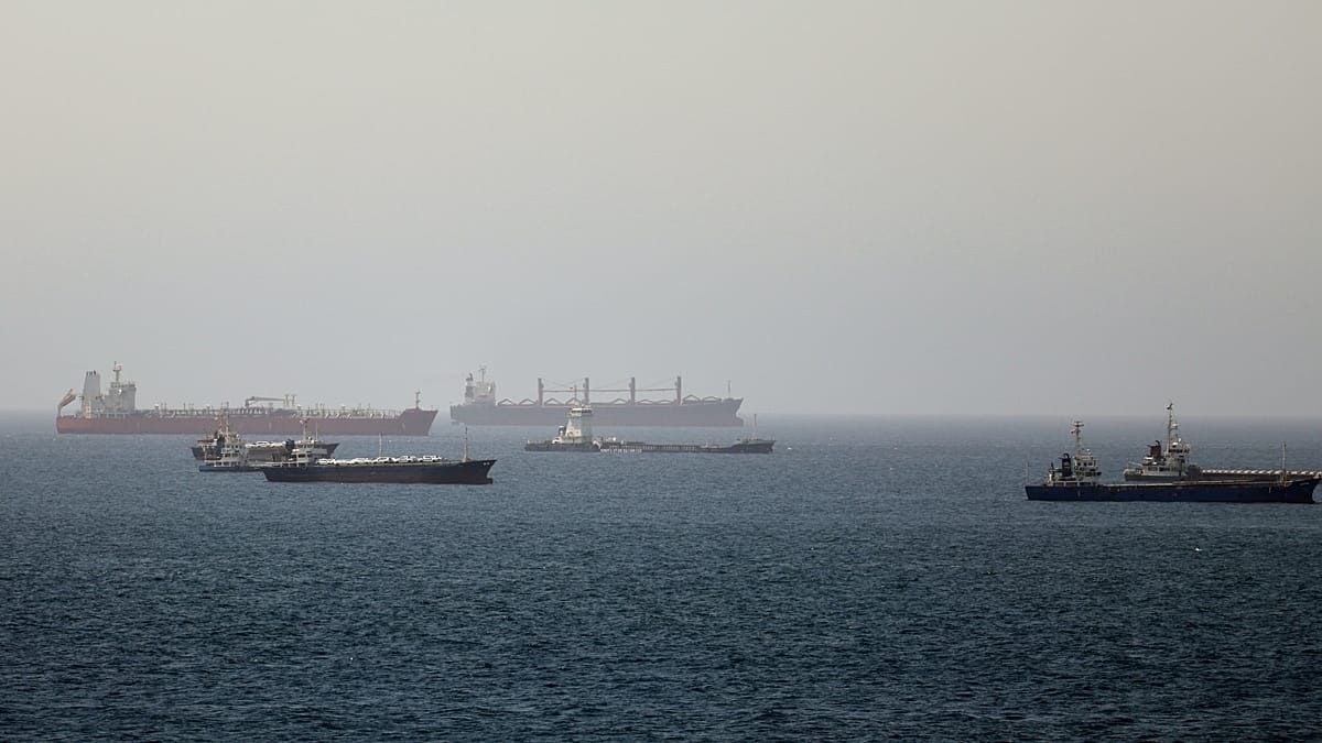 Oil tanker hit by 'unknown projectile' in Strait of Hormuz, British military says