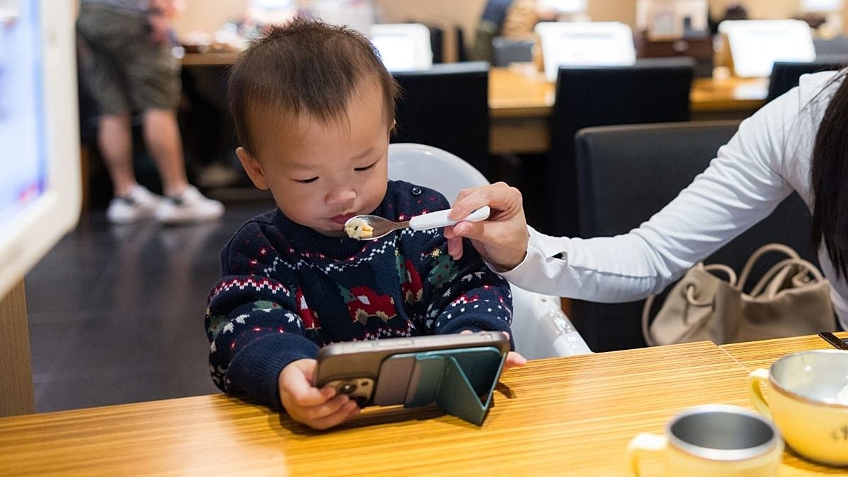 Babies should not use screens at all in the first two years, major review finds
