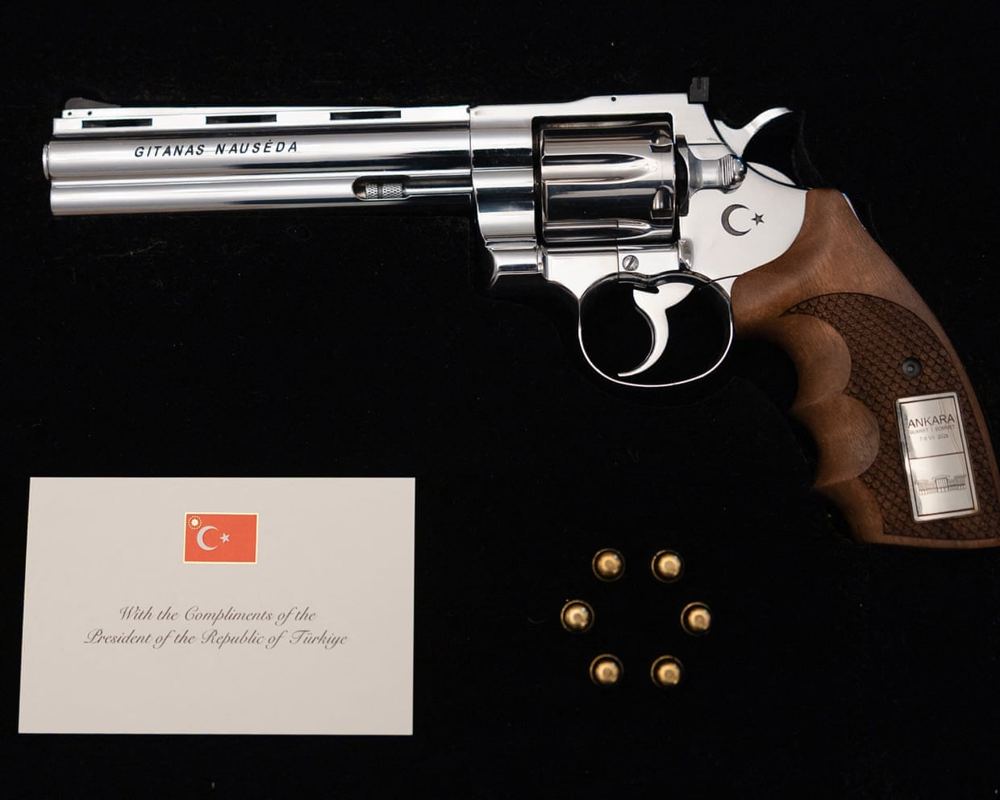 Nato leaders surprised by Turkish president’s gift of guns after summit