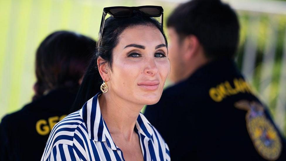Why is Ukraine rolling out the red carpet for a US far-right influencer?