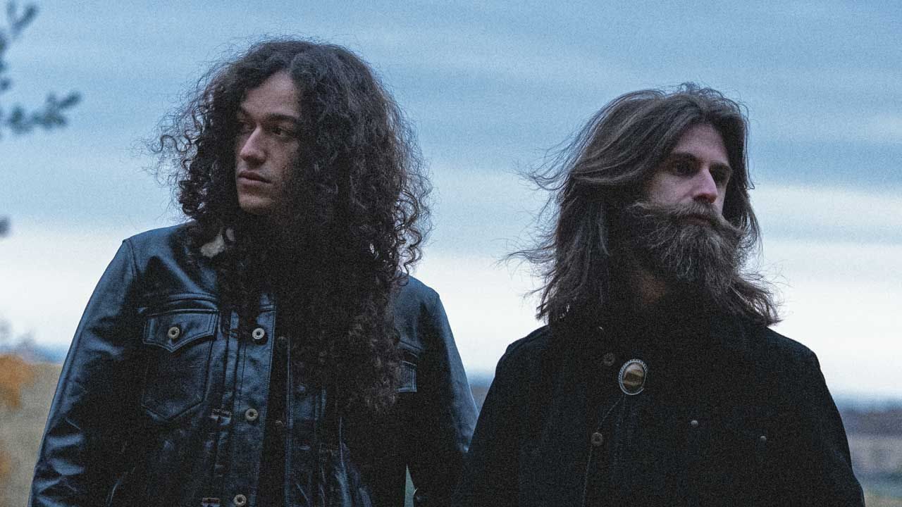 "We owed the label half a million dollars. There was no way we're gonna pay that back." Crown Lands talk music biz, 19-minute songs, and why they'd rather be killed by robots than zombies