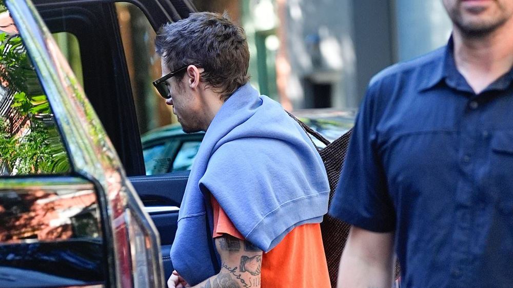Harry Styles dashes to his New York show in his signature shorts before cracking cheeky joke about his ex Taylor Swift's Madison Square Garden wedding during gig