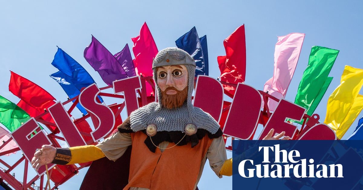 ‘It’s Glastonbury on wheels’: bards and musicians flock to eisteddfod to celebrate Welsh culture