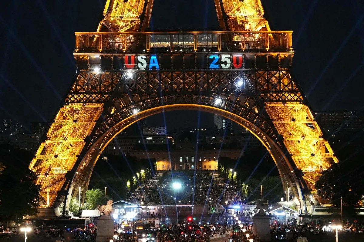 Man climbs Eiffel Tower and hangs US flag on America's big birthday