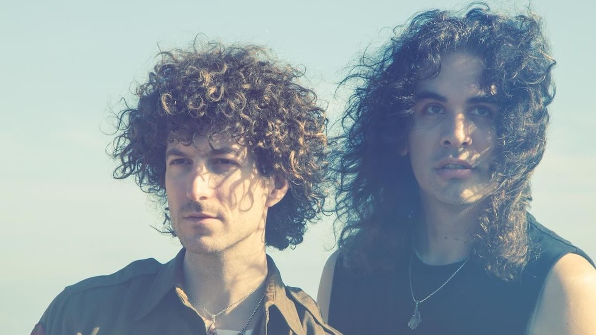 Stanley Simmons (Sons of KISS Legends) Unveil Debut Album Dancing While the World Is Ending: Stream