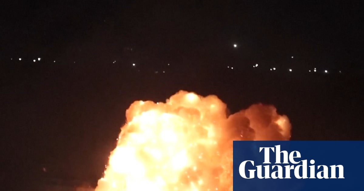 Russian drones and missiles pummel Kyiv on eve of Nato summit – video