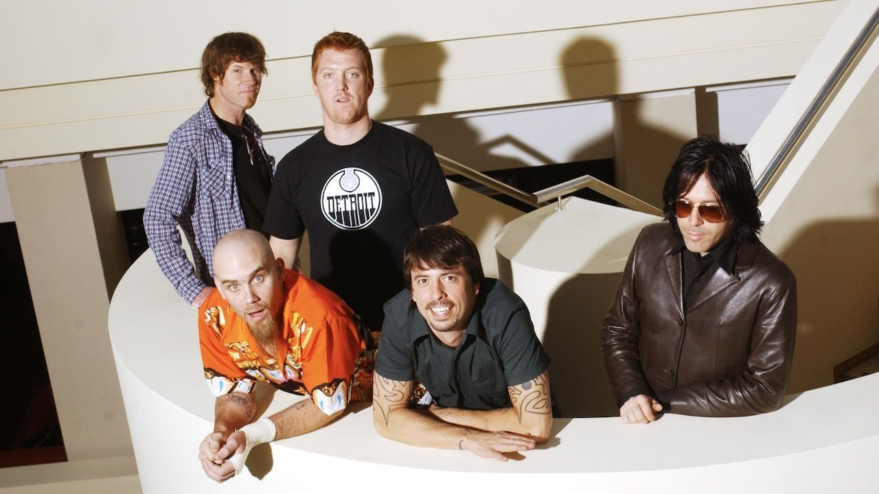 "Only badass mofos get to play in Queens Of The Stone Age." The story behind QOTSA's modern rock masterpiece Songs For The Deaf