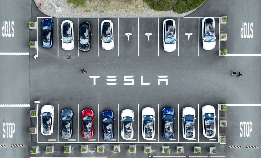 Tesla’s profits slide despite growing revenue as it pivots to robotics and AI